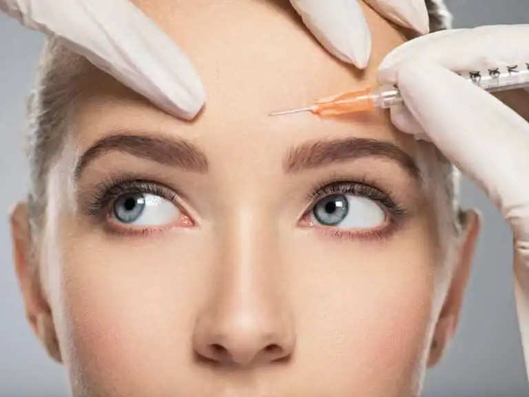 Botox treatment at Aakar Dermatology in Nepal showing a healthcare professional administering Botox injections to smooth facial wrinkles. The image highlights the procedure being performed in a clean, clinical environment, with emphasis on professional care. The price for Botox treatment at this clinic is approximately Rs. 500 per unit.